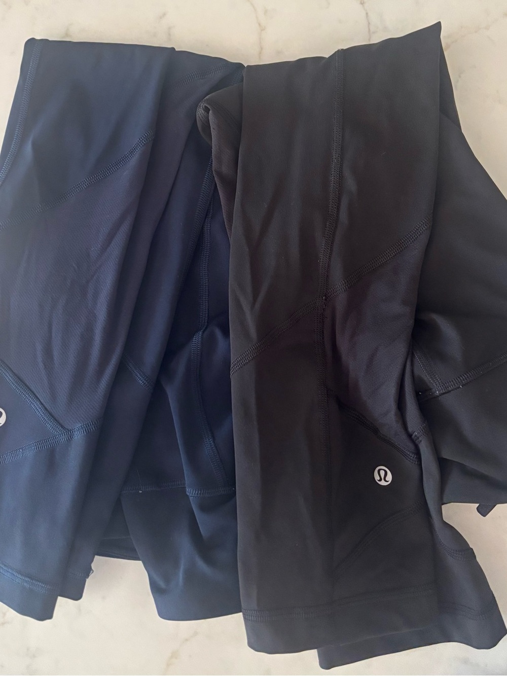 Bundle of 2 pace rival run leggings. Navy blue and black.